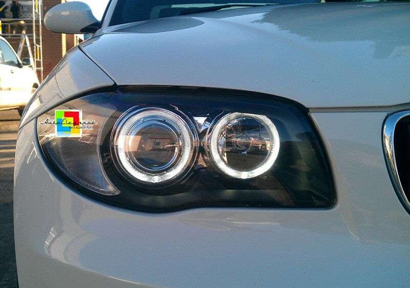 FARI Anteriori Angel Eyes LED Compatibile con BMW Serie 1 E81 E82 E87 E88 04-11 LENTICOLARI 