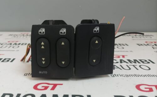 Lancia Dedra - coppia pulsanti alzacristalli originali con connettori acquista online